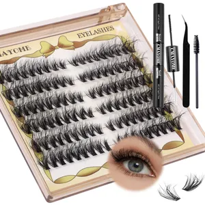 Macro view of cluster lash extension kit including bond, sealer and professional tweezers