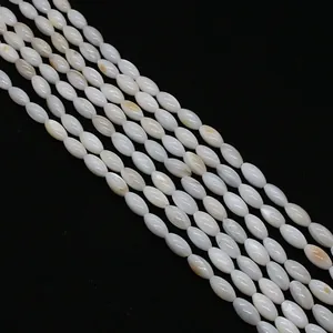 Macro shot of white mother-of-pearl marquise beads for DIY jewelry making with natural texture