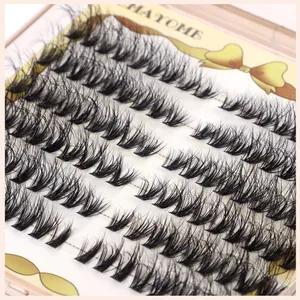 Macro shot of 484 clusters of dense black eyelash extensions in a MA YOME display case