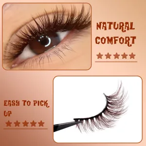 Thick dark brown multi-layered false eyelashes with tweezers for dramatic eye makeup
