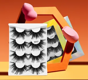 Detail of 4 pairs of 6D synthetic fiber eyelashes with two pink beauty sponges in a laser box
