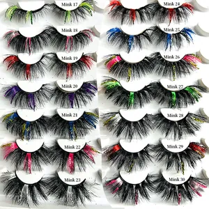 Dramatic 25mm mink eyelashes set featuring vibrant glitter and colorful fiber accents