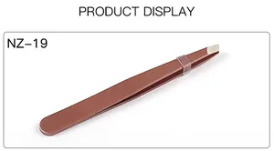 Detailed macro view of NZ-19 rose gold eyelash tweezers with protective cap and precise tips