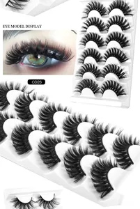 Close-up of CD26 thick curly 8D faux mink eyelashes with eye model display detail