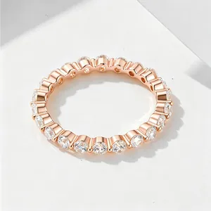 Detailed close-up of rose gold eternity ring with 2.5mm cubic zirconia stones
