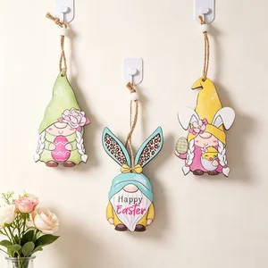Three wooden Easter gnome ornaments with Happy Easter text and white bead strings