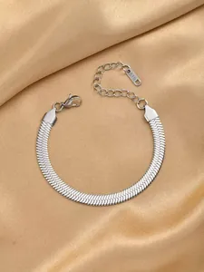 Detail of silver snake bone bracelet with lobster clasp and K18 engraved tag