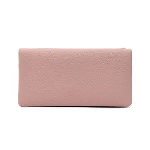 Minimalist long pebbled leather wallet in dusty pink with slim rectangular design