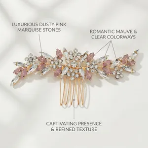 Detail of dusty pink marquise rhinestones and clear gems on a golden bridal hair comb