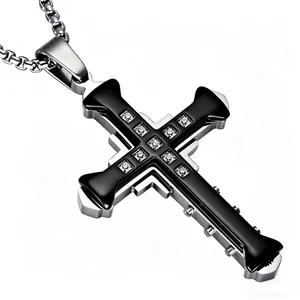Macro shot of silver-framed black cross necklace with crystals and ball chain