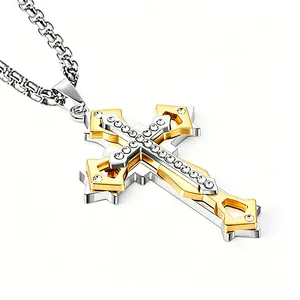 Detail of triple-layered cross pendant with gold and silver tones and white rhinestones