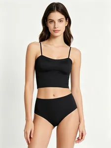 Detail view of seamless black lingerie set featuring thin straps and high waist panties