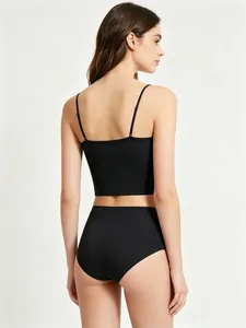 Back view of seamless black bralette and high-waist panty set with adjustable straps