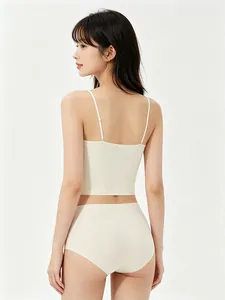Rear view of seamless beige camisole set with thin straps and high waist panties