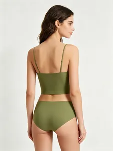 Detail view of seamless olive green lingerie set with thin straps and ribbed texture