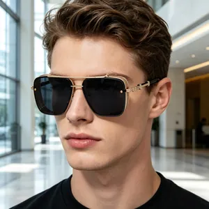 Close-up of retro punk square sunglasses with gold metal frames on male model