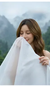 Detail of waterproof EVA fabric showing clear water droplets on a white semi-transparent poncho