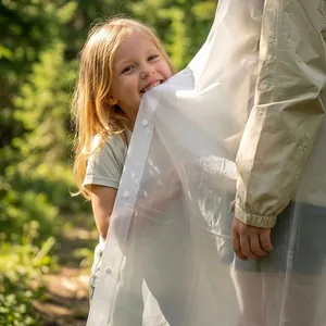 Reusable white translucent EVA raincoat with hood and snap buttons for kids outdoors
