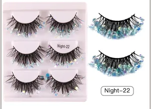 Detail of Night-22 false eyelashes featuring blue-purple sequins on black fibers