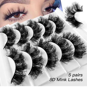 Détail de 5 paires de faux cils 8D montrant une texture croisée multicouche dense