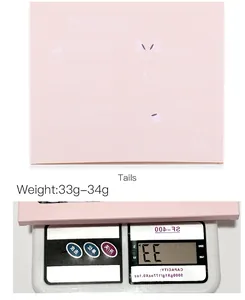 Detailed back packaging showing lash application guide and 33g product weight on scale