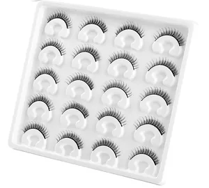 Detail view of 10 pairs of 3D faux mink eyelashes with natural curl and cross-weave style
