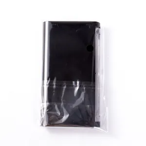 Detail of professional segmented individual lashes in a glossy black rectangular case