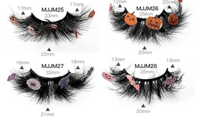 Détail de quatre styles de faux cils d'Halloween avec motifs festifs de citrouille et chauve-souris