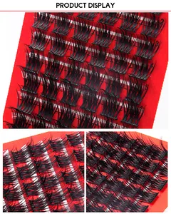 Macro view of individual black lash clusters with high curl on a red display board