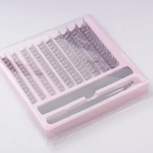 Macro detail of DIY 10-row lash extension kit with pink base, tweezers and spiral brush