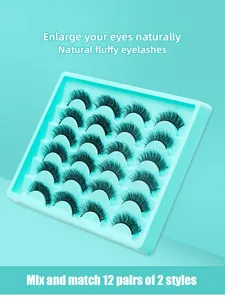 Makroaufnahme von 12 Paar flauschigen Kunstmink-Wimpern in einer mintgrünen Schale