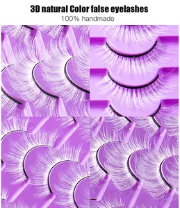 Detail view of handmade 3D white dramatic eyelashes showing feather-like texture