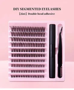 Detailed DIY segmented eyelash extension kit with glue and tweezers on pink tray