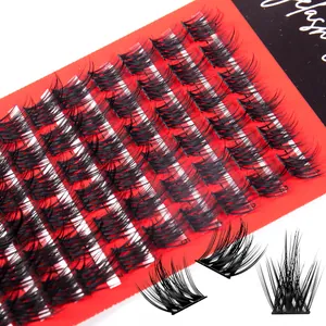 Cluster eyelashes with segmented wisps on a red card for natural eye makeup extension