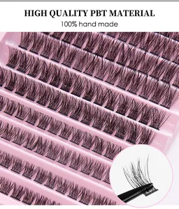 Close-up of 100% handmade PBT material individual eyelash clusters in pink tray