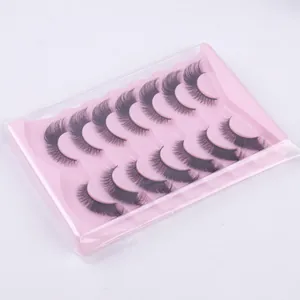 Detail of 10 pairs of dense black faux mink eyelashes in a pink tray packaging
