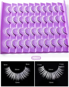 Detailed macro view showing white dramatic false eyelashes with 9mm to 15mm measurements