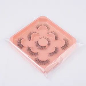 Detail view of 7 pairs set of fluffy faux mink eyelashes in a pink packaging tray
