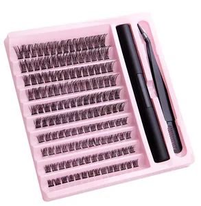 DIY individual eyelash cluster set with adhesive and tweezers in pink storage tray