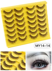 Detailed macro view of 14 pairs of thick cross-type faux mink eyelashes in a display tray