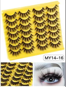 Close-up of 14 pairs of thick curly faux mink eyelashes in a yellow display tray