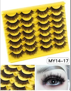 Macro detail of 14 pairs of thick curly faux mink eyelashes showing texture and volume
