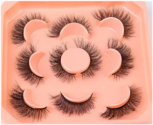 Detail of 7 pairs of layered faux mink eyelashes with fluffy crisscross volume design