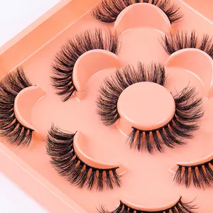 5 pairs of thick multi-layered faux mink eyelashes in a pink petal-shaped tray