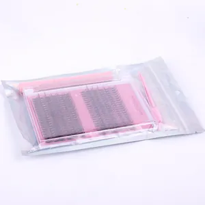 Kit d'extension de cils DIY avec cils noirs et accessoires roses dans une pochette argent