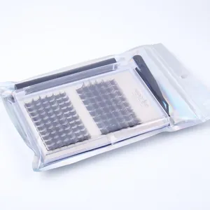Detailed DIY eyelash extension kit with lashes, tweezers, and glue in holographic bag