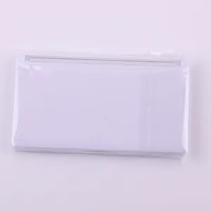 Detailed close-up of a white plastic replacement housing part for a handheld game console