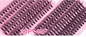 Détail macro de l'ensemble d'extensions de cils avec grappes 30P et 40P sur fond rose