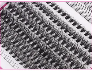 Macro shot showing high density DIY lash cluster assortment and lash book arrangement