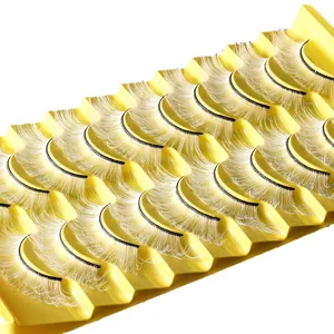 Dramatische witte valse wimpers set van 10 paar op geel dienblad voor feestelijke make-up